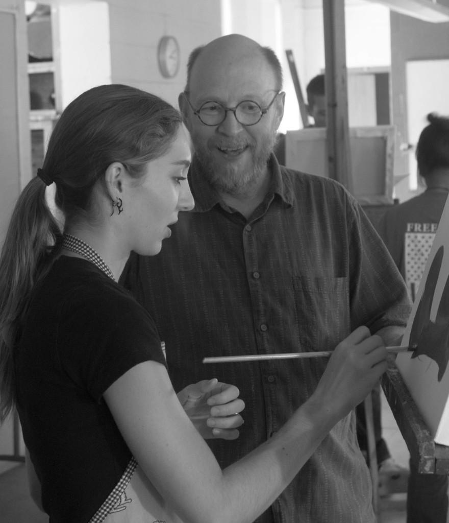 Matthew LaRose teaching a painting class with junior, Laura Thies.