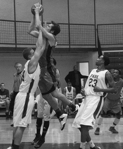 Torr Woodhouse, Senior sets his feet anticipating the charge. Denzelle Cook, Senior, Forward sprints in for the rebound. The Men are now 2-4 after a loss to Mid-America Nazerene at home Tuesday night.