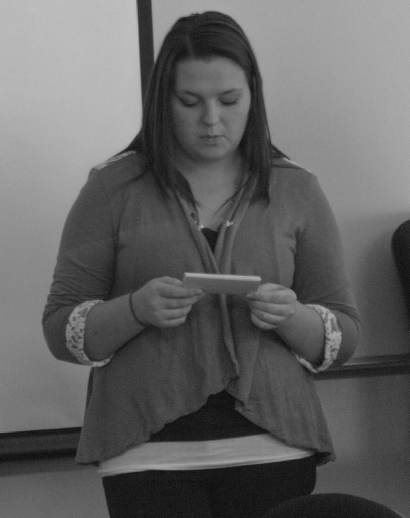 Natalie Motta performs a speech in front of her public speaking class Dec. 3 about President Barack Obama's blueprint for education reform. Motta is focusing her education degree on English.