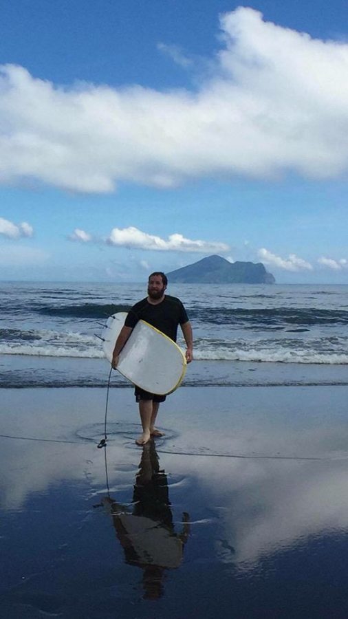 James Boyer on the Wai-ao Beach in Yilan County, Taiwan, after surfing.