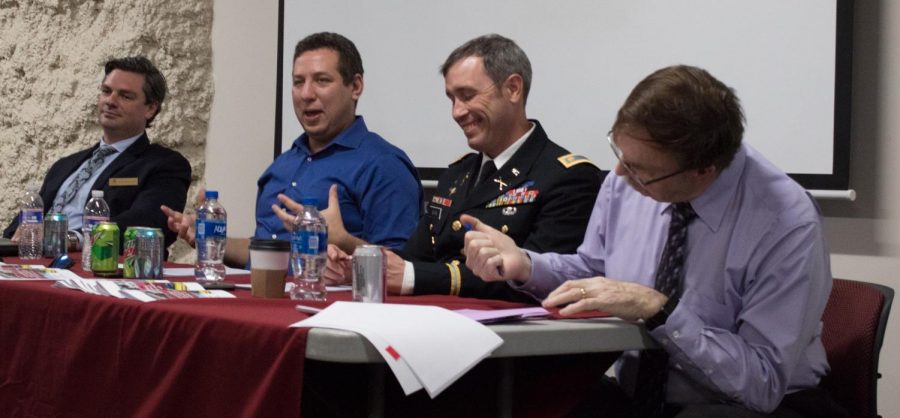 From left: Dr. Jack A. MacLennan, Dr. Jacob Stoil, Major Joe Evans, and Dr. Pete Schifferle held a panel to discuss defense spending and geopolitics