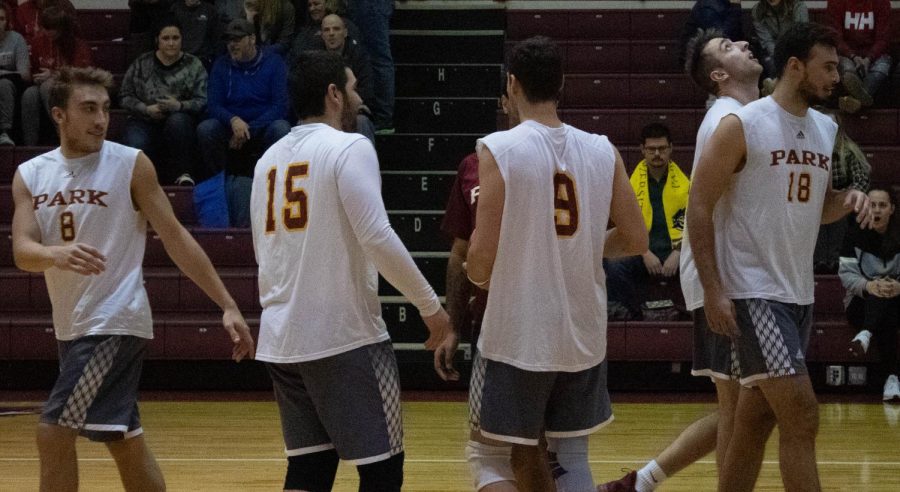 Arthur Decker, sophomore Luciano Bucci, senior Andrea Maggio, sophomore Felipe Guirau , sophomore Felipe Chagas in volleyball jerseys prepare for another play.