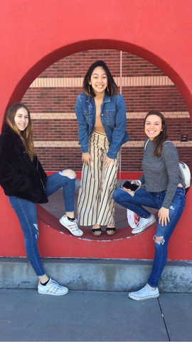 Freshmen Victoria Starke, Mikayla Pham and Corrie Scobee members of Gamma Chi Pi, pose together for a group picture.