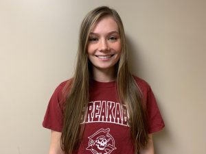 Chloe Satterfield wearing a red Park volleyball shirt