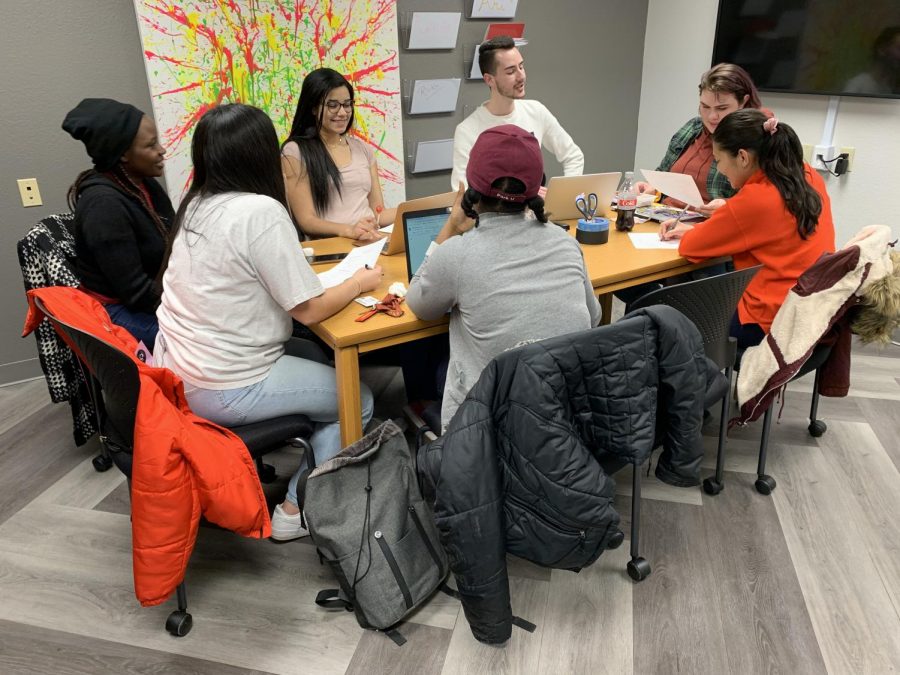 The executive members are in a meeting to plan this semester's events
