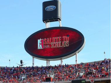 billboard at Arrowhead Stadium that says Salute to Scholars with Park emblem