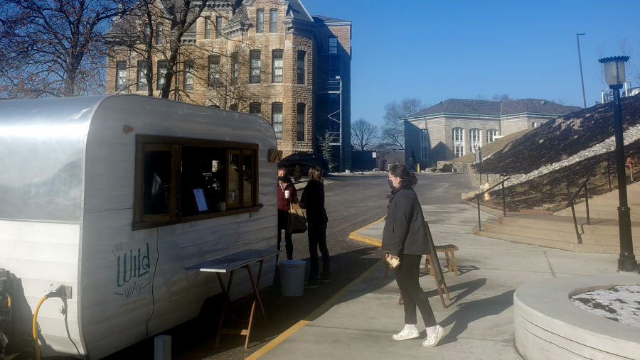 park student walking up to the coffee truck