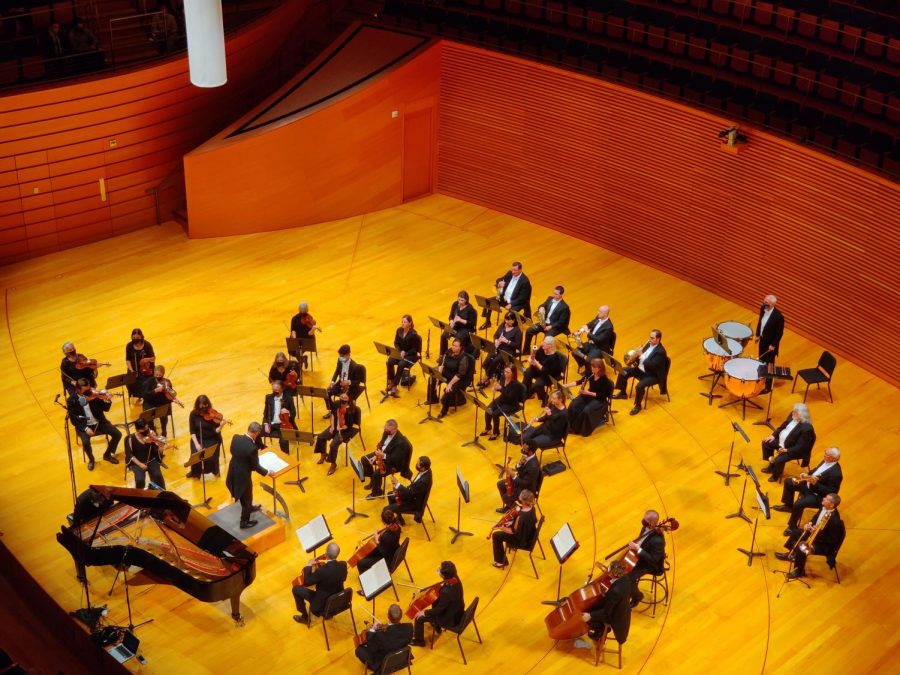 Kenny Broberg and the Kansas City Chamber Orchestra on stage in Helzberg Hall at the Kauffman Center for Performing Arts.